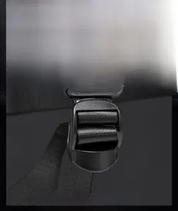 Macro shot of durable adjustable buckle and woven nylon strap on a 16-inch laptop backpack