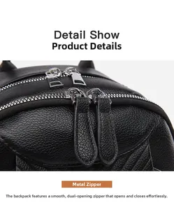 Detail view of smooth silver metal zippers on black lychee textured leather backpack