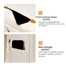 Detailed view of the front vertical zipper pocket and side storage on a beige backpack