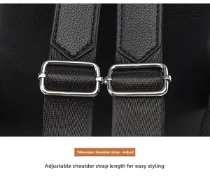 Detail of adjustable nylon shoulder straps with silver metal buckles on black leather backpack