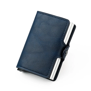 Detailed 45-degree angle of a blue leather RFID blocking wallet with dual aluminum card holders