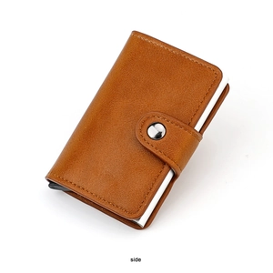 Detailed side view of brown leather RFID blocking wallet with pop-up aluminum card holder