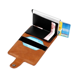 Detail of RFID aluminum wallet with brown lychee leather and pop-up card mechanism
