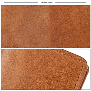 Macro shot of brown leather texture and precision stitching on the RFID card wallet