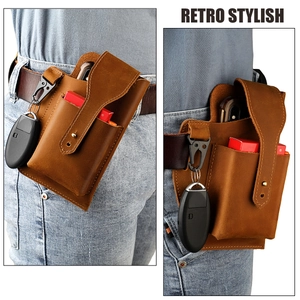 Detail of retro leather belt pouch showing double storage and metal spring key buckle