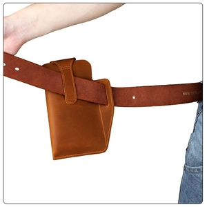 Close-up of brown crazy horse leather belt pouch showing genuine texture and stitching