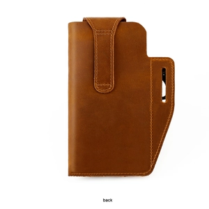 Detail view of the belt loop on a vintage brown genuine leather men's waist phone holster