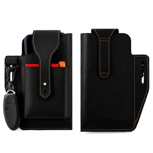 Macro detail of black crazy horse leather belt pouch with orange stitching and key hook