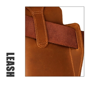 Macro detail of brown crazy horse leather stitching on vintage belt waist bag