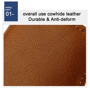 Detail view of brown cowhide leather with durable stitching on men RFID card holder