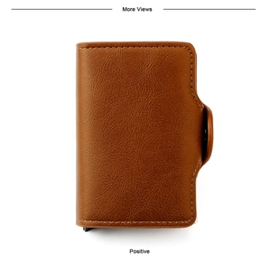 Detail of caramel brown lychee leather RFID wallet with dual aluminum pop-up card mechanism