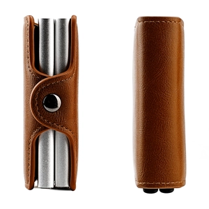 Detailed view of brown leather RFID wallet featuring double aluminum card slots and snap closure