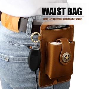 Macro shot of vintage brown leather waist bag showing pockets for phone and cigarettes
