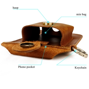 Detail view of crazy horse leather phone belt pouch with hasp and keychain
