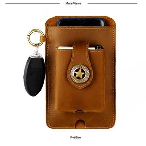 Close-up of brown crazy horse leather belt pouch showing metal buckle and carabiner