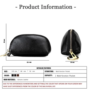 Close-up of genuine leather car key case with litchi texture and gold metal zipper detail