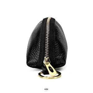 Side view of black pebble grain leather car key case with a premium gold zipper and ring