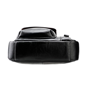 Close-up of black leather bag with white contrast stitching and durable multi-layer structure
