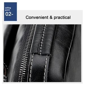 Close-up of black cowhide leather bag with white stitching detail and durable zipper