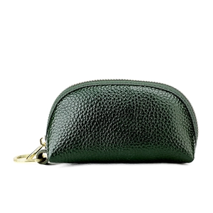 Detail of dark green pebbled leather coin purse with top zipper and golden keychain