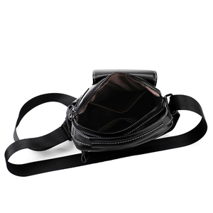 Men's black leather crossbody bag with white stitching and adjustable strap details