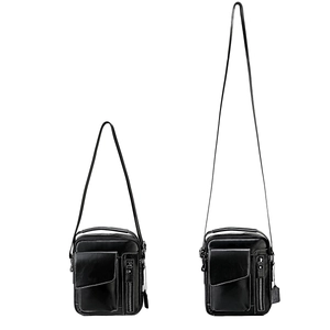 Men's genuine leather crossbody bag in black with multiple pockets and adjustable strap