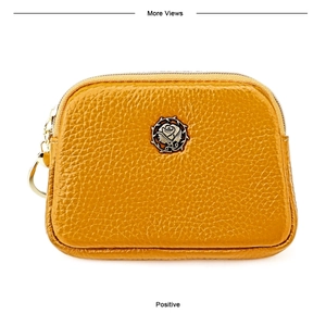 Nahaufnahme der gelben Leder-Geldbörse mit Vintage-Rosen-Metallverzierung und Zipper