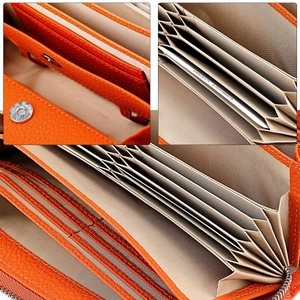 Detail view of orange leather wallet with multiple card slots and an accordion compartment