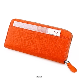 Detail of orange pebble leather long wallet featuring a metal zipper and external bill slot