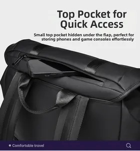 Top detail of black waterproof backpack featuring a hidden zipper pocket and nylon handle