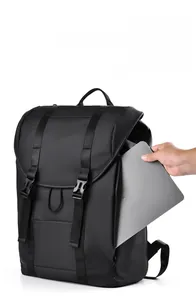 Detail of the side zipper on a black city backpack for easy laptop access