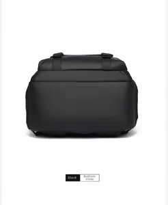 Detailed bottom view of black travel backpack showing reinforced wear-resistant base