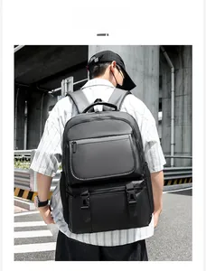 Street style shot of a black multipurpose travel backpack with side buckles and mesh pocket