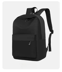 Side view of black oxford backpack showing waterproof fabric and ergonomic shoulder straps