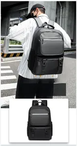 Detail of multi-functional black backpack with waterproof texture and wide breathable straps