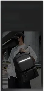 Detail of durable backpack featuring wide reflective safety strips for night visibility