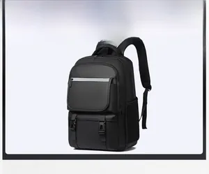 Detail view of the black lightweight backpack showing side mesh pocket and buckle straps