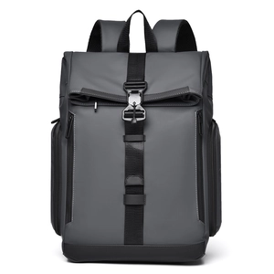 Deep grey waterproof roll-top backpack with industrial metal buckles and mesh straps