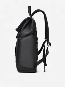 Side view of matte black roll-top backpack showing breathable straps and side pocket