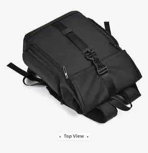 Top view of waterproof black tactical backpack showing heavy-duty straps and mesh padding