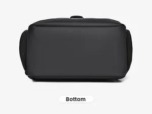 Macro view of a black water-resistant nylon backpack showing sturdy bottom stitching