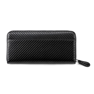 Macro detail of men's long zipper wallet showing premium carbon fiber texture and weave