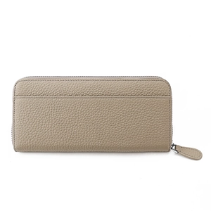 Detail view of the taupe pebbled leather wallet featuring a back slip pocket and zipper