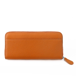 Detail of long brown genuine leather wallet with RFID blocking and precise white stitching
