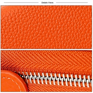 Close-up of orange litchi grain leather texture and durable metal zipper detail