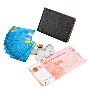 Detail view of black textured slim money clip wallet with multiple card slots and cash pocket