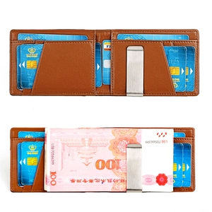 Macro detail of brown leather wallet featuring internal silver money clip and card slots