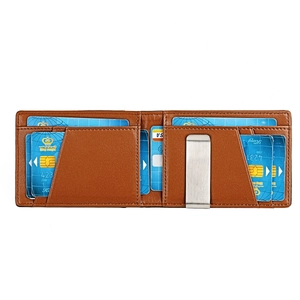 Detail view of brown leather slim wallet featuring a sturdy stainless steel money clip