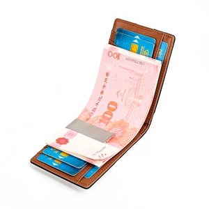 Slim brown leather money clip wallet with multiple card slots and stainless steel clip