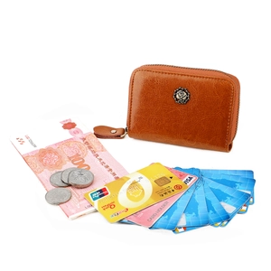 Detail of brown leather wallet with retro rose metal logo and multi-card storage
